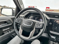 The 2024 GMC Sierra includes adaptive cruise control, a heated steering wheel, and leather seats wit... (image 9)