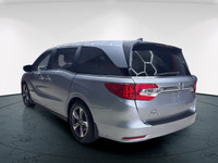 Meet the 2019 Honda Odyssey EX-L RES, a silver front-wheel-drive van that promises a smooth journey... (image 4)