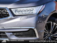 This 2020 MDX Tech Package features heated leather seating , jeweled headlights, a multi view back u... (image 6)