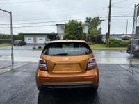 ONE OWNER This 2017 Chevrolet Sonic LT Auto 4dr Hatchback in vibrant orange is sure to turn heads! W... (image 1)