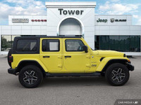 Turn heads and conquer any terrain in this vibrant 2024 Jeep Wrangler Sahara, boasting a striking Hi... (image 7)