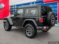 This Jeep Wrangler has a trusty Regular Unleaded V-6 3.6 L/220 engine powering this Manual transmiss... (image 3)