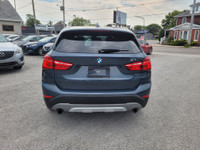 2016 BMW X1 AWD, Power locks, Power widows, Cruise control, AM, FM, CD, Bluetooth, Navigation, 4 Doo... (image 4)