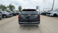 This Cadillac XT5 is equipped with: Leather Seating Surfaces w/Mini Perforated Inserts, Power moonro... (image 9)
