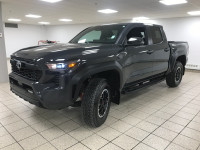 Stock Number 250510A Celebrate your adventurous spirit with the 2024 Toyota Tacoma TRD Off-Road, bui... (image 1)