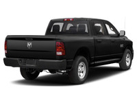 The 2021 Ram 1500 Classic Express 4x4 Crew Cab 57 Box is a bold black truck with an impressive 44 dr... (image 3)
