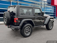 This Jeep Wrangler has a trusty Regular Unleaded V-6 3.6 L/220 engine powering this Manual transmiss... (image 6)
