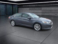 A rare and engaging manual transmission sedan offering comfort and performance. The Touring trim inc... (image 1)
