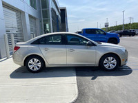 The 2014 Chevrolet Cruze 1LS offers a practical and efficient driving experience in a compact sedan.... (image 8)