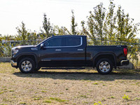 The 2024 GMC Sierra 1500 SLT blends bold design, refined luxury, and modern technology into a powerf... (image 4)