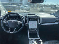 This 2023 Ford Edge SEL is a perfect blend of style and practicality. Boasting heated leather seats... (image 9)