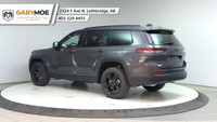 The 2025 Jeep Grand Cherokee L Limited 4x4, in a sophisticated gray, is designed to offer a commandi... (image 2)