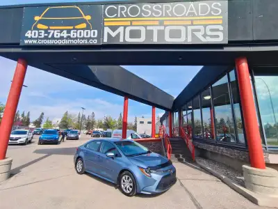 The 2021 Toyota Corolla LE is a compact sedan that offers a blend of efficiency, comfort, and advanc...