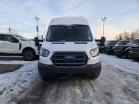 This brand new OXFORD WHITE 2024 FORD E-TRANSIT CARGO VAN is powered by a ENHANCED RANGE ELECTRIC EN... (image 1)