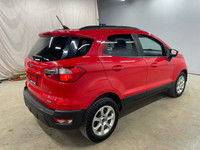 Looking for a fun and fuel-efficient ride to navigate Canadian streets? Check out this vibrant red 2... (image 6)