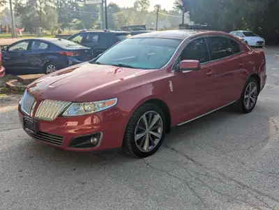 Looking for a stylish and comfortable sedan that won't break the bank? Look no further than this 200...