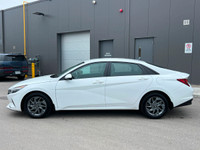 WAS: $21995 NOW: $21285 plus taxes and licensing feesCeramic White 4D Sedan I4 CVT FWD | Heated Seat... (image 2)