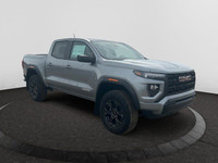 This 2025 GMC Canyon in Sterling Metallic is equipped with 4WD and Turbocharged Gas I4 2.7L/ engine.... (image 6)