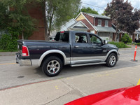 2014 Ram 1500 4WD Crew Cab Laramie Loaded with luxury and power, this full-size pickup features prem... (image 4)