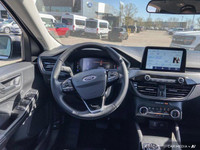 This Ford Escape has a strong Intercooled Turbo Premium Unleaded I-3 1.5 L/91 engine powering this A... (image 8)