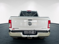 The 2020 Ram 2500 Big Horn in a classic white exterior and rugged 4x4 drivetrain promises unparallel... (image 6)