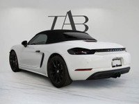 This striking 2017 Porsche 718 Boxster S Roadster delivers the thrill of open-air driving with premi... (image 4)