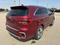 This 2019 Kia Sorento is finished in striking Passion Red Metallic with a refined Black interior, of... (image 7)
