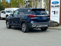 This 2023 Kia Seltos has a Blue exterior and Black seats with seating for 5. Equipped with a 1.6 L 4... (image 4)