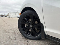 This 2023 Honda Odyssey Black Edition boasts a luxurious Platinum White Pearl exterior and a strikin... (image 9)