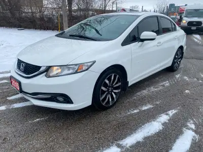 2015 Honda Civic Touring Edition: White on Black Leather Interior. This vehicle comes with: Push Sta...