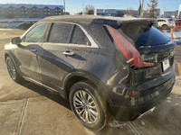 Introducing the New 2025 Cadillac XT4 Premium Luxury AWD, a sleek and sophisticated SUV in MIdnight... (image 5)