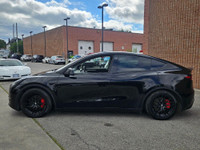 Unleash instant torque and futuristic performance with this 2023 Tesla Model Y Performance—solid bla... (image 2)