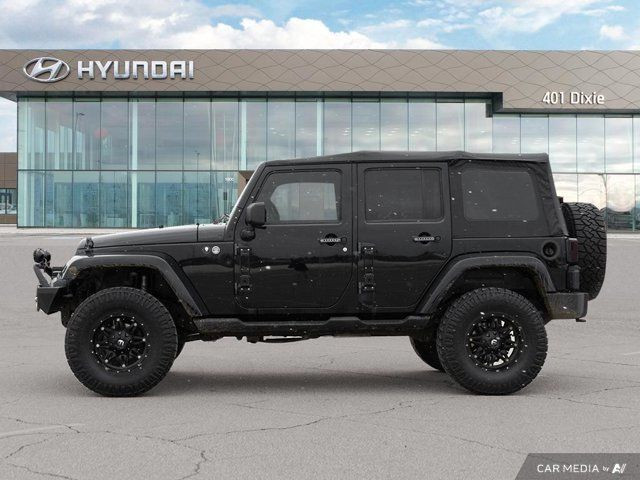 2013 Jeep Wrangler Unlimited Sahara in Cars & Trucks in Mississauga / Peel Region - Image 2