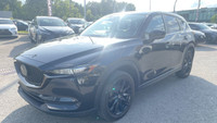 Le Mazda CX-5 Touring 2021 est un VUS compact qui allie style, performance et confort. Positionné da... (image 7)