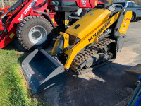 New Holland C314 Stand on skid steer