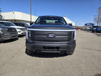 This brand new CARBONIZED GREY METALLIC 2025 FORD F-150 LIGHTNING FLASH is powered by an ELECTRIC EN... (image 1)