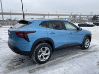 The 2025 Chevrolet Trax LS in Marina Blue Metallic is a stylish and efficient subcompact SUV. Its sl... (image 6)