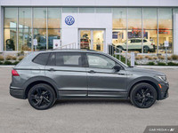 This Volkswagen Tiguan boasts a Intercooled Turbo Regular Unleaded I-4 2.0 L/121 engine powering thi... (image 5)