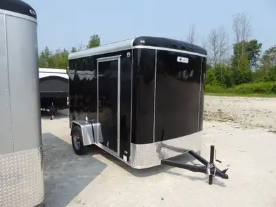 Continental Cargo Size 6×10 $7,495 STANDARD FEATURES 3,000lb Spring Axle 15” Radial Tires 6’ 9” Inte...