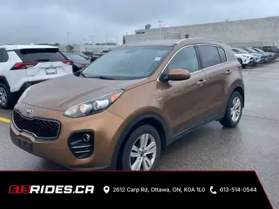 Looking for a reliable and versatile SUV? Check out this bronze 2017 Kia Sportage AWD 4dr LX, availa...