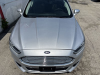 TITANIUM | AWD | LEATHER HEATED AND COOLED SEATS | SUNROOF This 2016 Ford Fusion Titanium offers a r... (image 1)