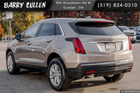 The 2023 Cadillac XT5 FWD Luxury in an elegant tan hue with its nimble front-wheel drive is all abou... (image 6)