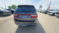 This Dodge Durango is equipped with: Cloth Bucket Seats, Power Sunroof, Front Heated Seats, Heated S... (image 9)