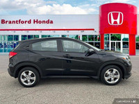 Sleek, black exterior and impressive fuel efficiency—this 2016 Honda HR-V LX is ready for your next... (image 6)