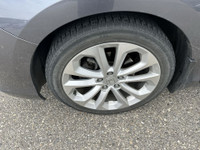 A rare and engaging manual transmission sedan offering comfort and performance. The Touring trim inc... (image 9)