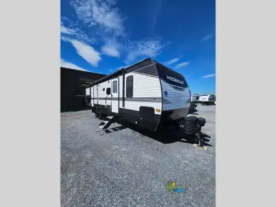 Keystone Hideout travel trailer 318BR highlights: Large Private Bunkhouse Outdoor Kitchen Dual Entry...
