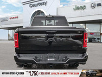 This Ram 1500 has a trusty Twin Turbo Premium Unleaded I-6 3.0 L/183 engine powering this Automatic... (image 4)