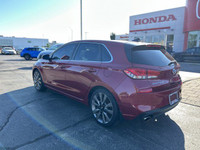 Experience the spirited performance of this 2018 Hyundai Elantra GT Sport Hatchback, boasting a fier... (image 6)