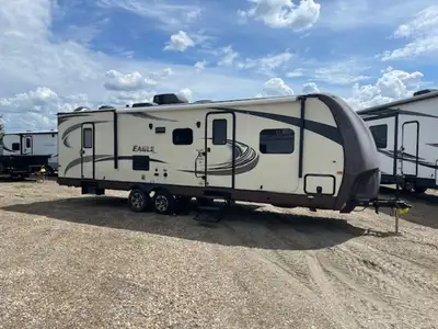 Spacious Family Floorplan Front Queen Bed, Rear Double Bunks, U-Dinette & Sofa Slide Sleeps Up to 9!...