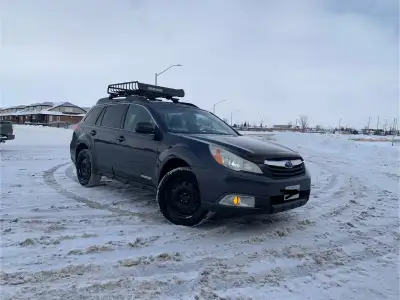 2011 Subaru Outback 2.5i Features: -Symmetrical all-wheel drive; best awd system on the market. Unbe...